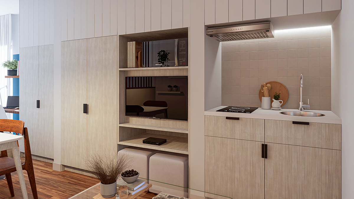 A compact kitchen integrated with TV, book, and pouf niches, alongside hidden storage, all highlighted by cosy lighting for a functional and inviting space.