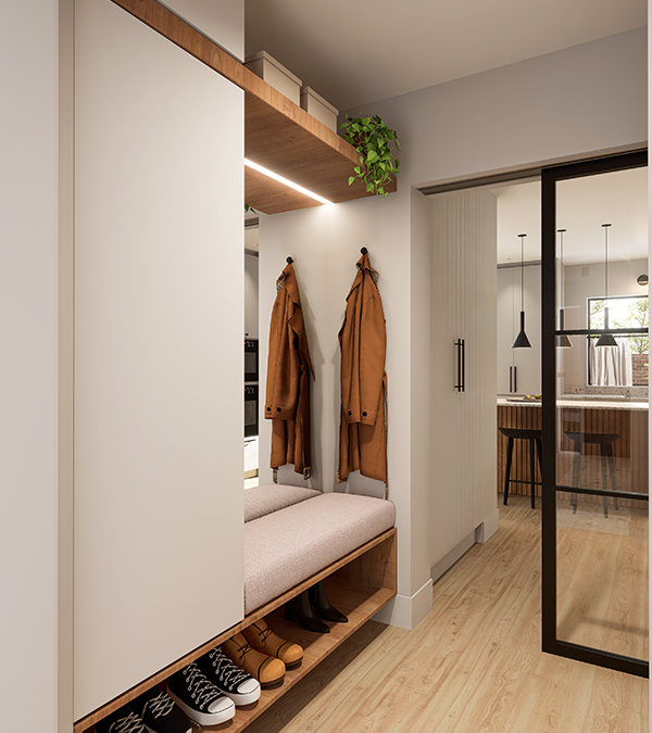 A mudroom with inventive storage and bespoke joinery, seamlessly connecting the entrance to the kitchen.